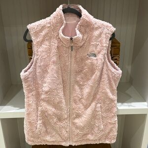 The North Face Reversible Mossbud Swirl Vest in pink faux fur